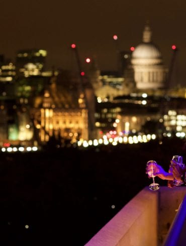 The Buffini Chao Deck event hire space exterior at night looking east to St Paul's