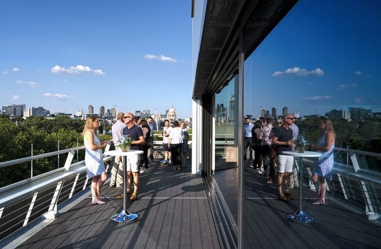 The Buffini Chao Deck event hire space - terrace exterior with people, looking east to St Paul's Cathedral