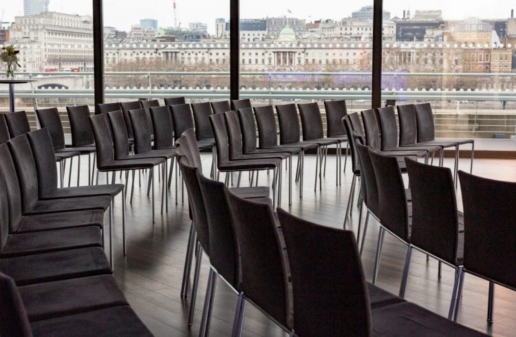 The Buffini Chao Deck event hire space: conference setup with seating and view of Somerset House