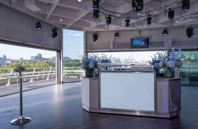 The Buffini Chao Deck event hire space interior with bar and view east towards St Paul's