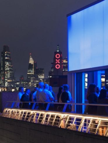 The terrace of the Buffini Chao Deck at night, looking east