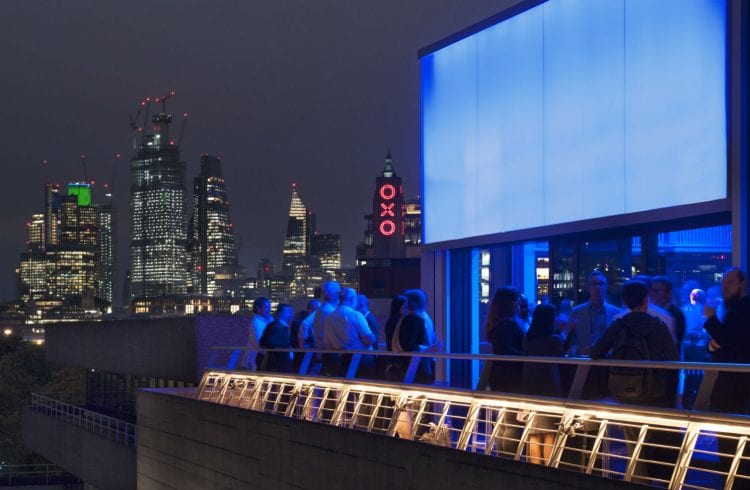The terrace of the Buffini Chao Deck at night, looking east