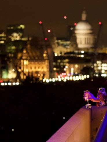 The Buffini Chao Deck terrace at Night, looking towards the City