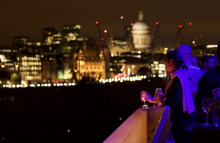 The Buffini Chao Deck terrace at Night, looking towards the City