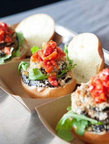 KERB mini-burgers in little boxes on a steel tray