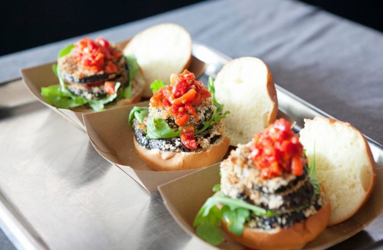 KERB mini-burgers in little boxes on a steel tray