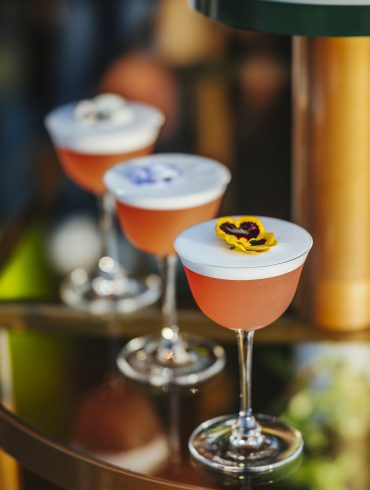 three glasses of Bellini cocktails