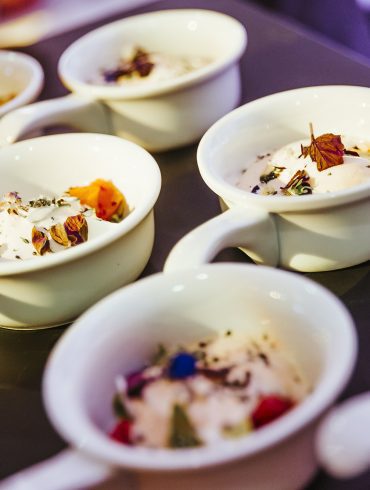 Food served in small bowls with handles