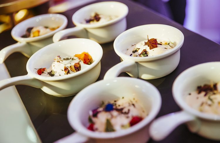 Food served in small bowls with handles
